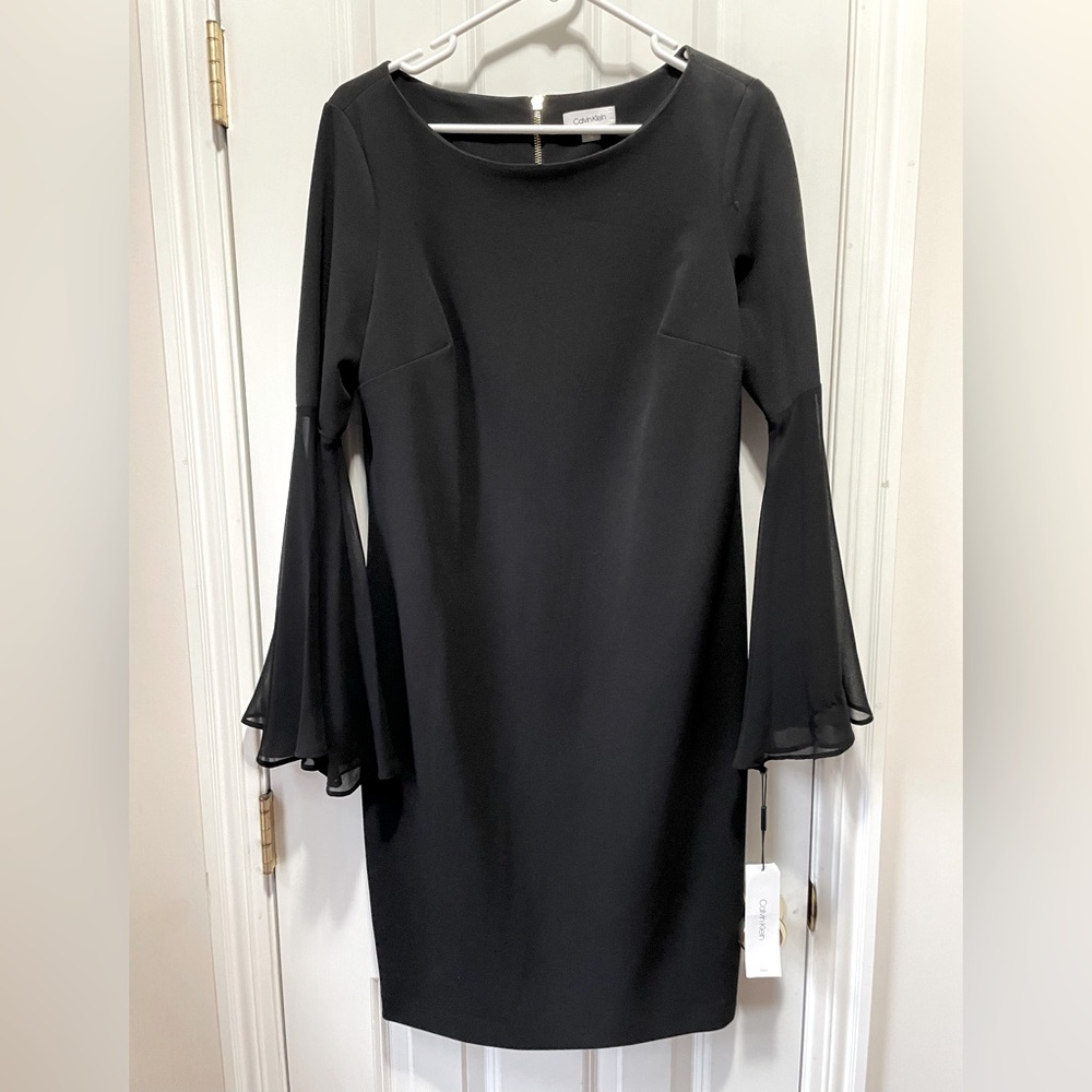Calvin Klein black evening dress, new with tags. Size 14